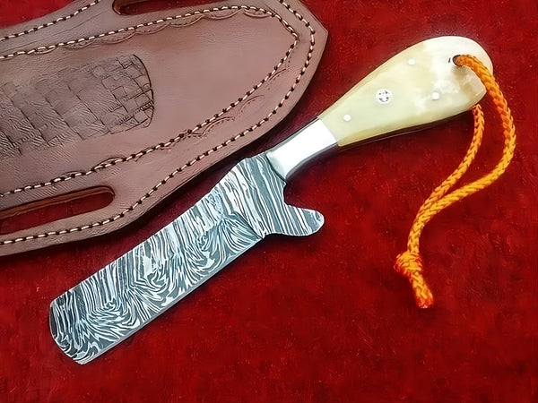 Custom Bull Cutter Cowboy Knife showcasing sharp edge and craftsmanship.
