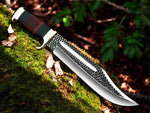 Custom Crocodile Dundee knife with a high-carbon steel blade and leather sheath.