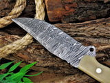 Razor-sharp Damascus skinning knife with bone handle, 8.25-inch blade, and leather sheath.