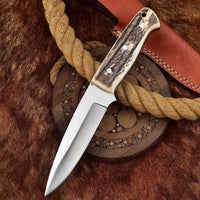 Great skinning knife with a 7.25-inch razor-sharp D2 steel blade and antler horn handle.
