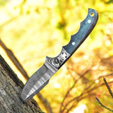 Great skinning knife with custom Damascus steel blade and colored bone handle, Rockwell Hardness 55-58 HRC.
