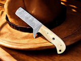 Bull Cutter with protective pancake sheath.