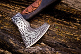 Close-up of the Battle Axe blade showing intricate metal etching details
