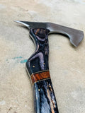 Detailed view of the exotic and rosewood handle on the throwing tomahawk