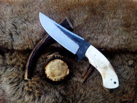 Custom handmade 1095 hunting knife with camel bone handle
