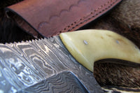 Close-up of the bone handle on the Alaskan skinning knife.